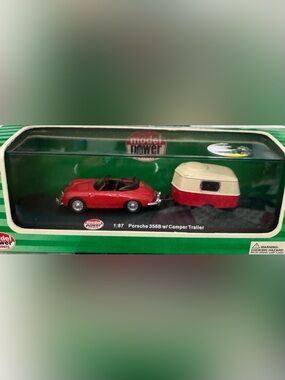 Die cast Porsche with camper trailer